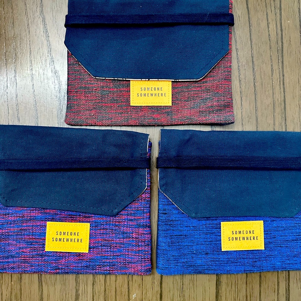 Delta One Someone Somewhere artisan collab travel pouch.